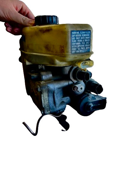 2002-2004 Porsche Boxster Used ABS Pump — w/o Porsche Stability Management, traction control and automatic limited slip differential